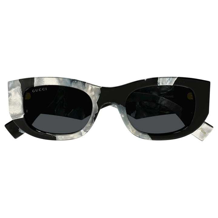 Gucci Geometric Full Rim, with a Black and White Mop Havana frame and Grey lens.