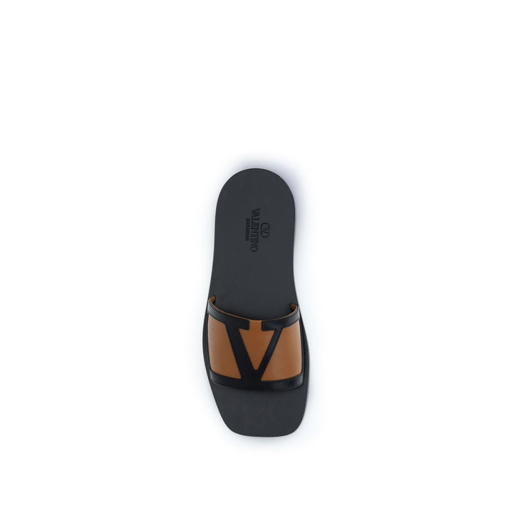 Valentino Garavani Black Calf Leather Bos Taurus Flat Sandals by Valentino Garavani outlet now on sale