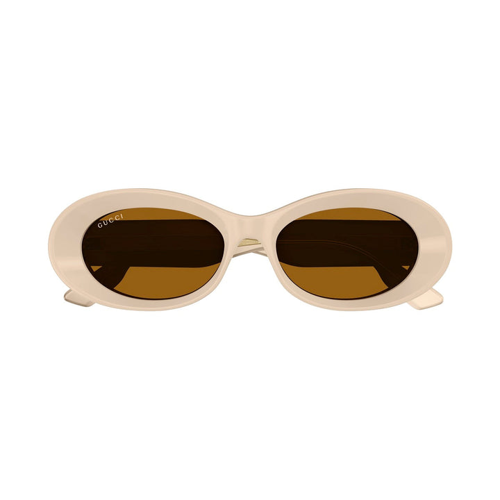 Gucci Oval Full Rim, with a Beige frame and Rust Brown lens.