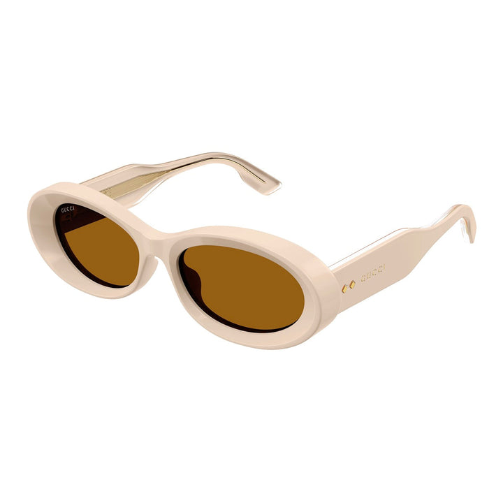 Gucci Oval Full Rim, with a Beige frame and Rust Brown lens.