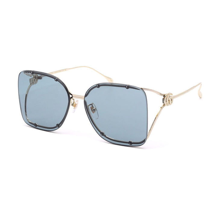 Gucci Geometric Rimless, with a Gold frame and Grey lens.