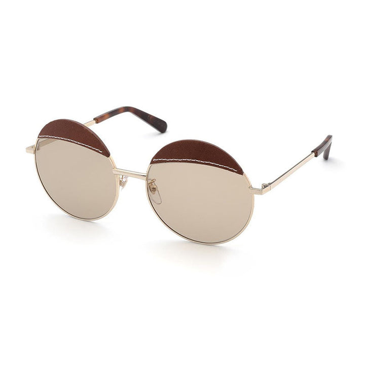 Loewe Round Full Rim, with a Gold Brown Leather frame and Brown lens.