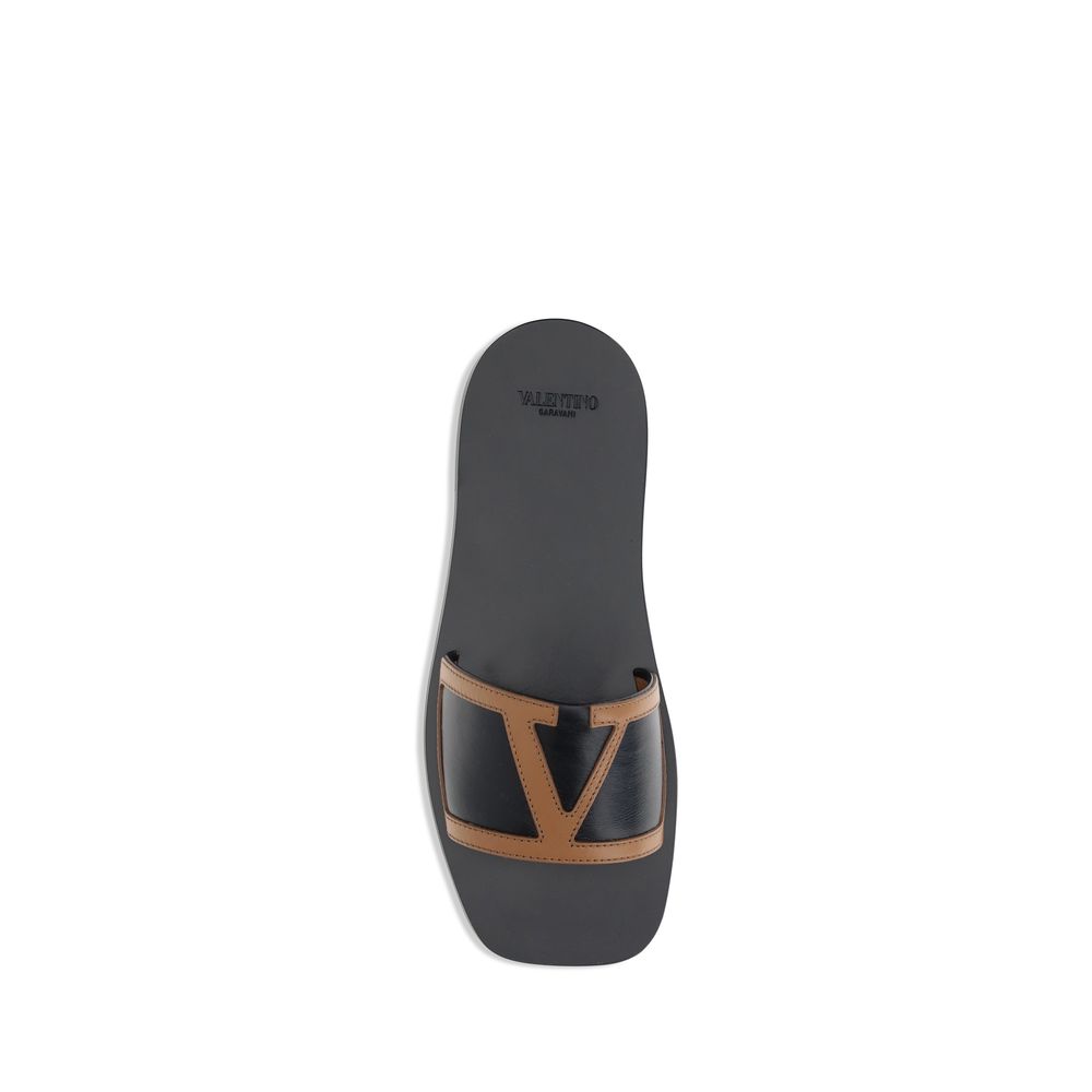 Valentino Garavani Black Calf Leather Bos Taurus Flat Sandals by Valentino Garavani outlet now on sale
