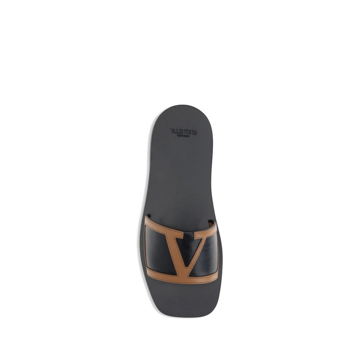 Valentino Garavani Black Calf Leather Bos Taurus Flat Sandals by Valentino Garavani outlet now on sale