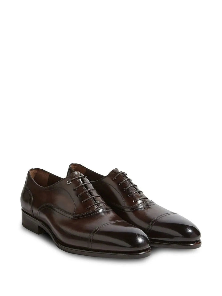 Ferragamo Gancini Leather Oxford Shoes in BROWN