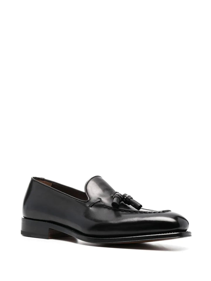 Ferragamo Almond-Toe Tassel Loafers in BLACK