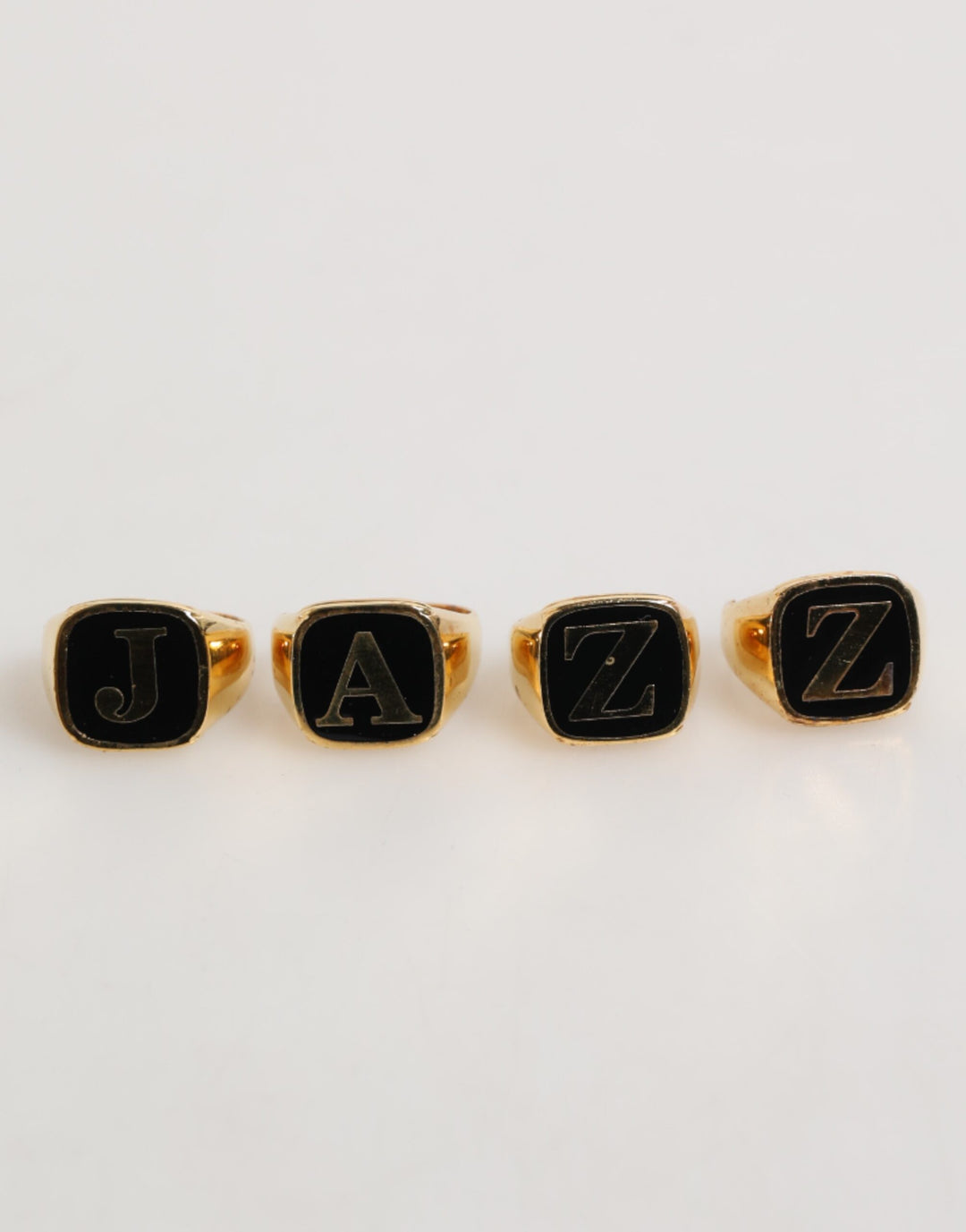 Dolce &amp; Gabbana Sample Sale Dolce &amp; Gabbana Gold Tone Brass JAZZ Letter Set 4 Pieces Adjustable Ring - | Designer outlet