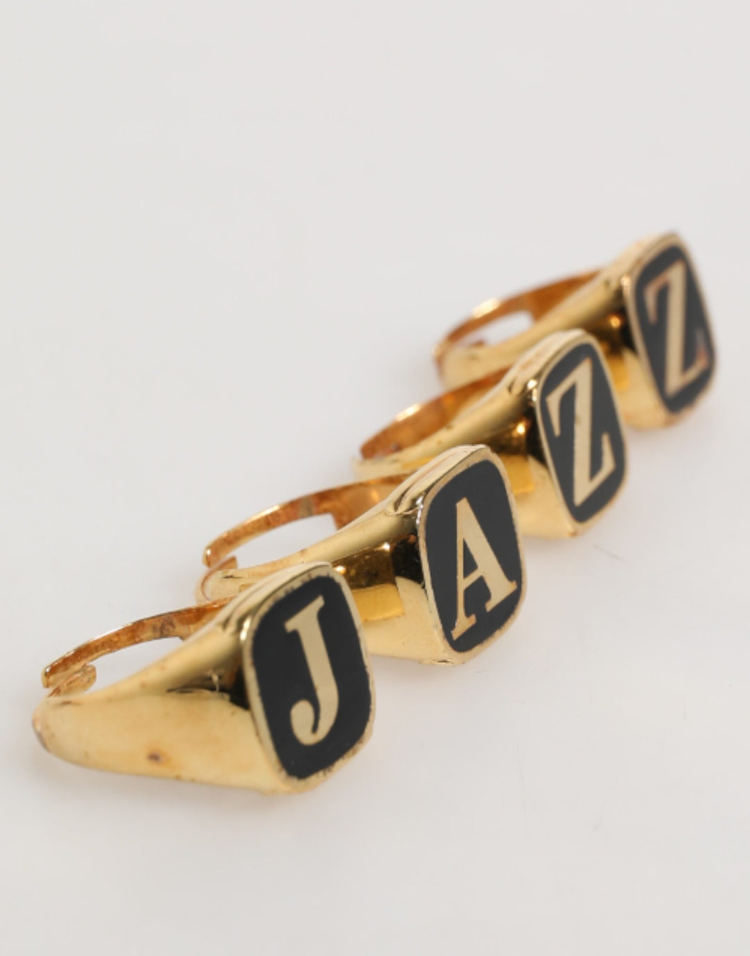 Dolce &amp; Gabbana Sample Sale Dolce &amp; Gabbana Gold Tone Brass JAZZ Letter Set 4 Pieces Adjustable Ring - | Designer outlet