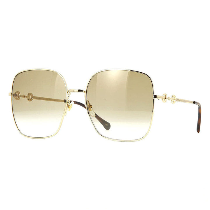 Gucci Square Full Rim, with a Gold frame and Brown Gradient lens.