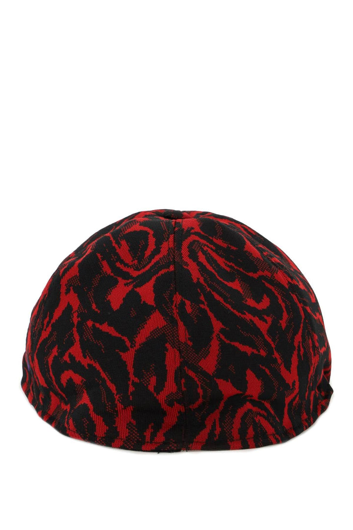 Gorra plana de jersey jacquard Baracuta X Needles