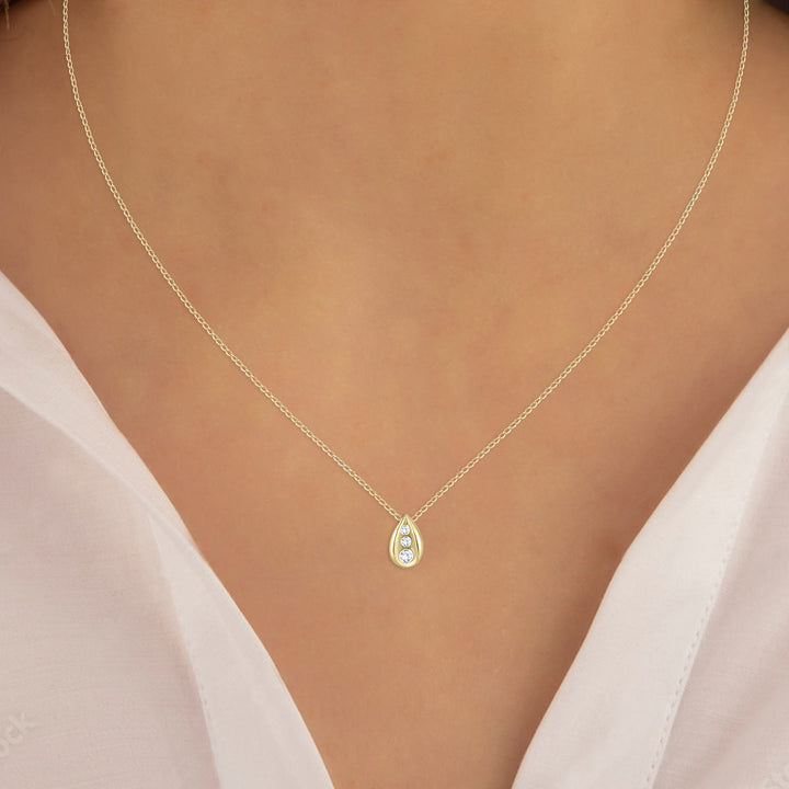 1/4 Carat Tw Three Stone Diamond Tear Drop Pendant In 14K Yellow Gold