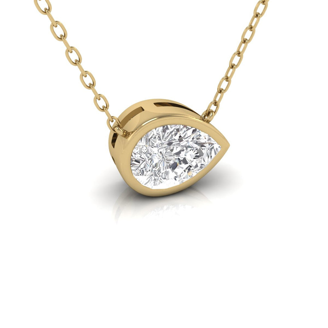 Lab Grown 1/2 Carat Pear Shaped Bezel Set Diamond Solitaire Pendant In 14K Yellow Gold