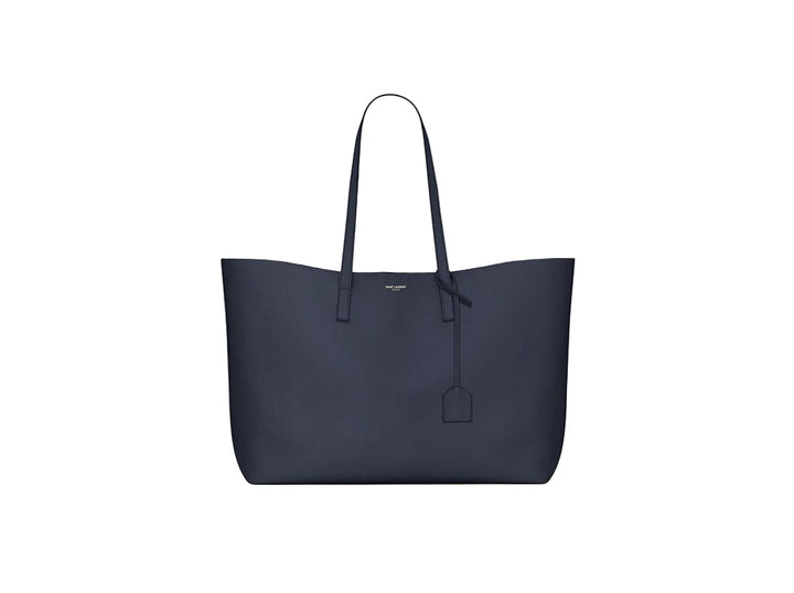 Navy blue tote bag on a light gray background