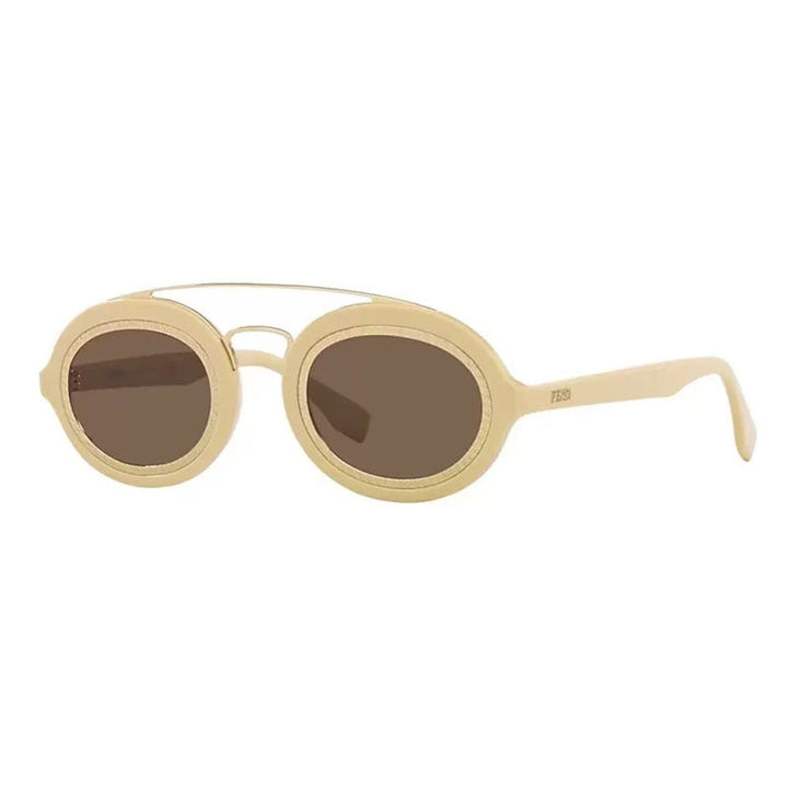 Fendi Oval Full Rim, with a Ivory/Gold frame and Brown lens.
