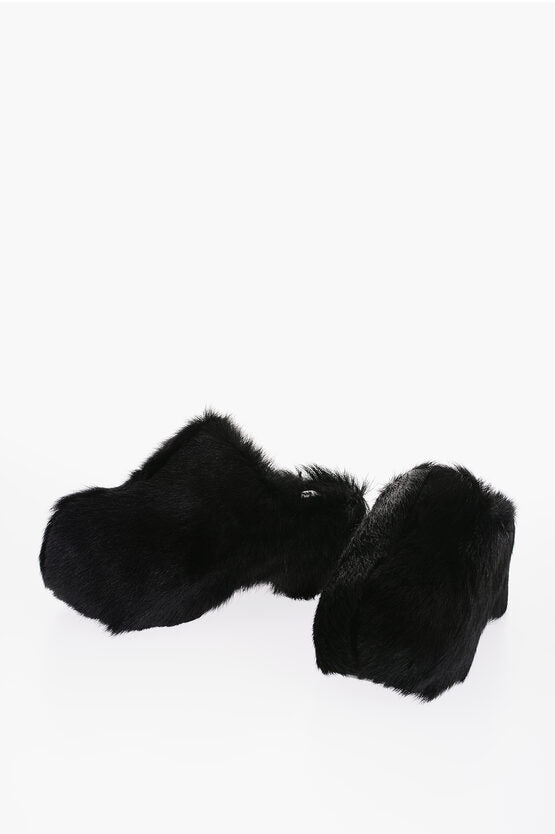 Mules gruesos de piel de Jil Sander