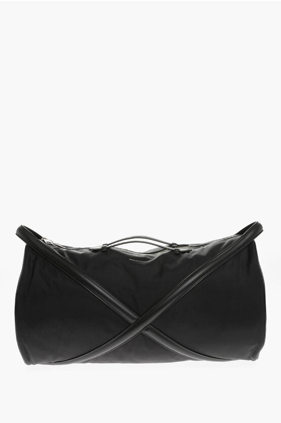 Bolso de viaje THE HARNESS de Alexander McQueen con detalles de piel