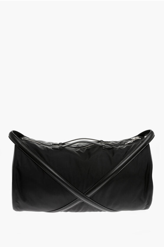 Bolso de viaje THE HARNESS de Alexander McQueen con detalles de piel